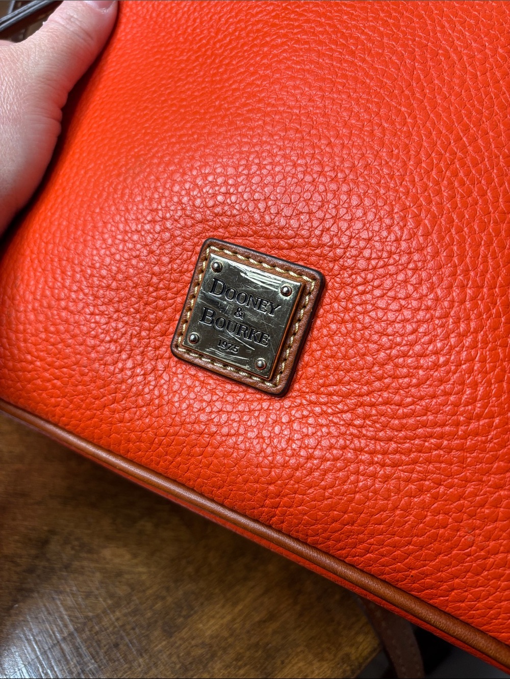 Dooney & Bourke Pebbled Grain Crossbody Orange Leather Bag with Red Interior - Picture 14 of 16